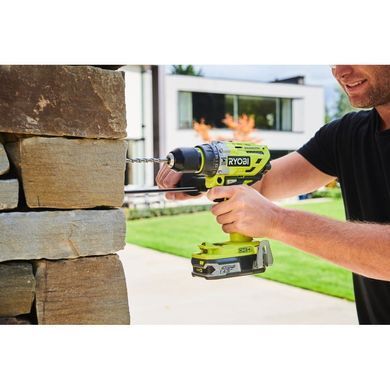 Шуруповерт-дриль Ryobi ONE+ R18PD7-220B, 18В, ударний, безщітковий, 85Нм, 2х2.0Ач